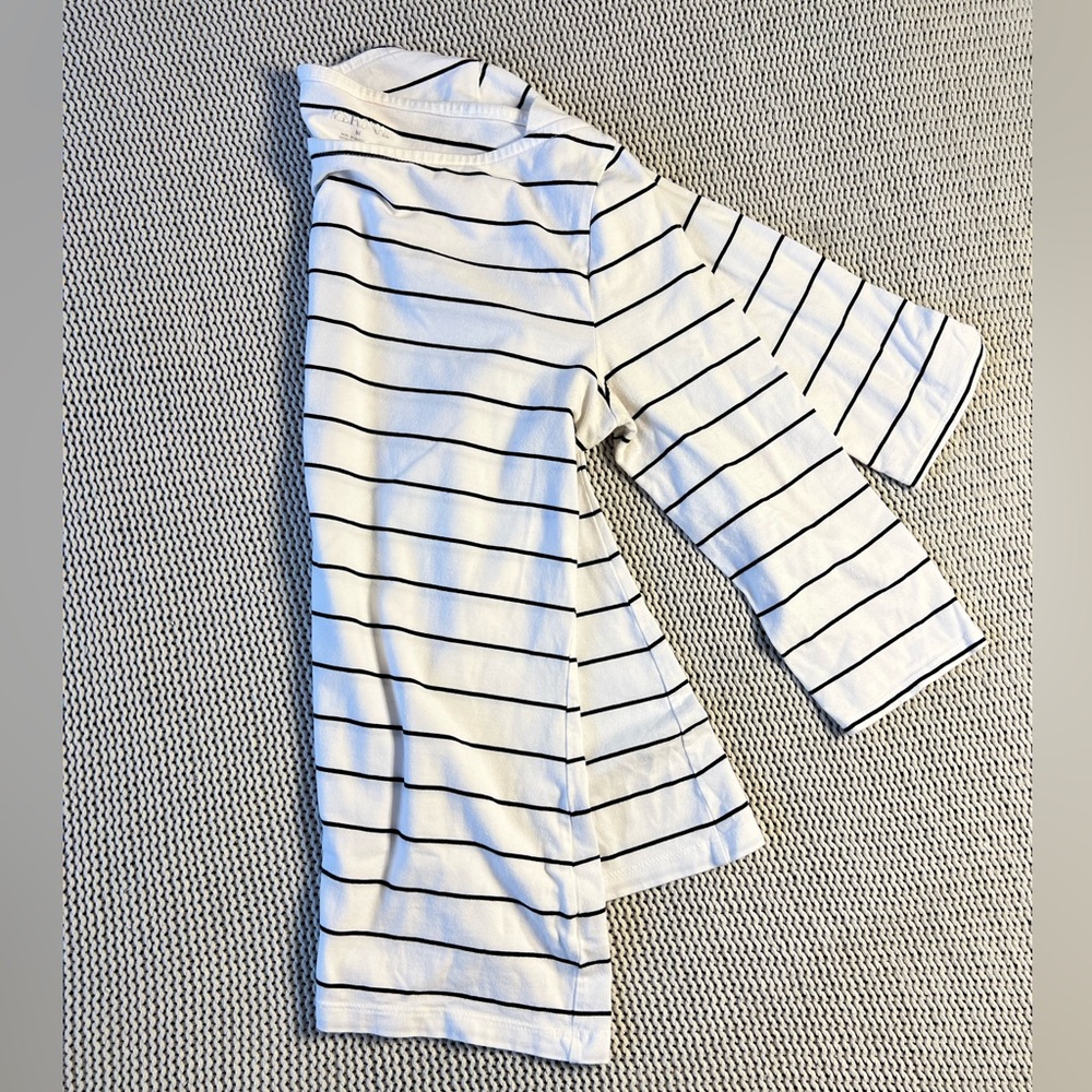 White 3/4 length knit top with horizontal black stripes